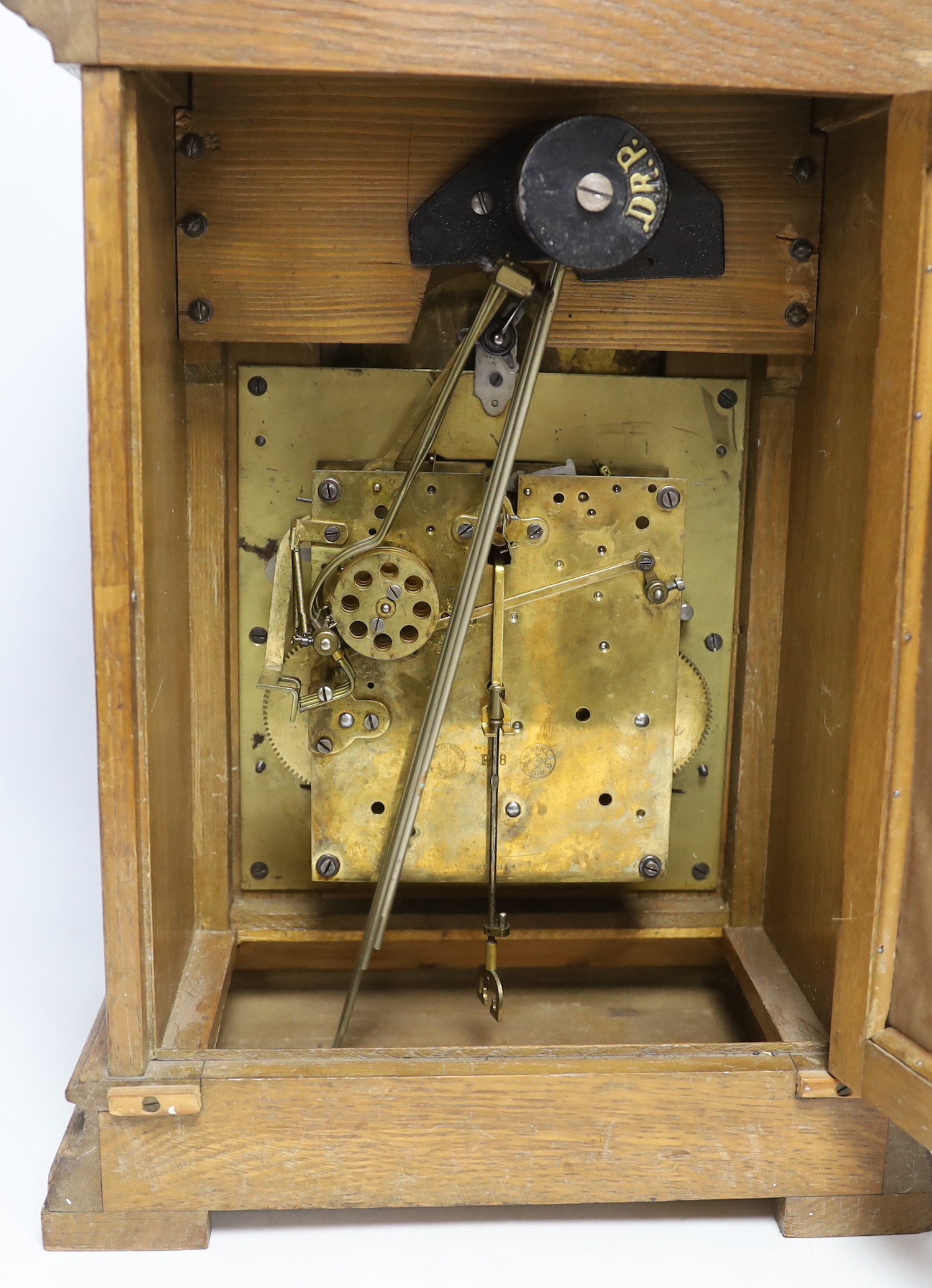 A 1920's Gustav Becker oak bracket clock with three train movement, striking and chiming on five gongs, 42.5cm high